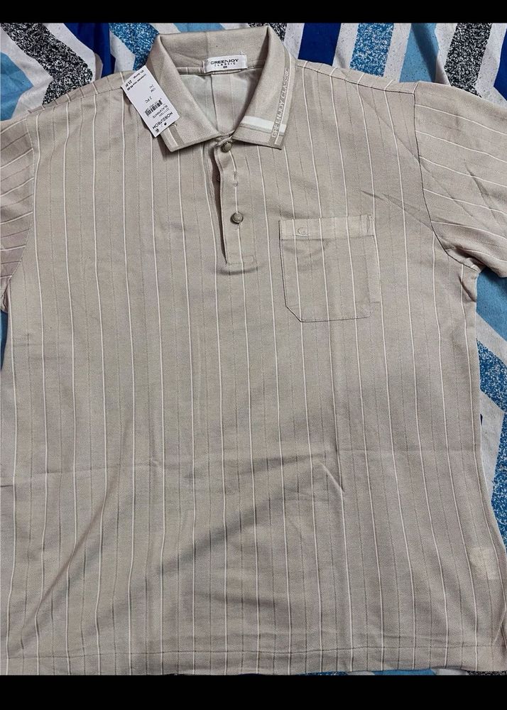 Green Joy Classic Tan colored striped polo shirt