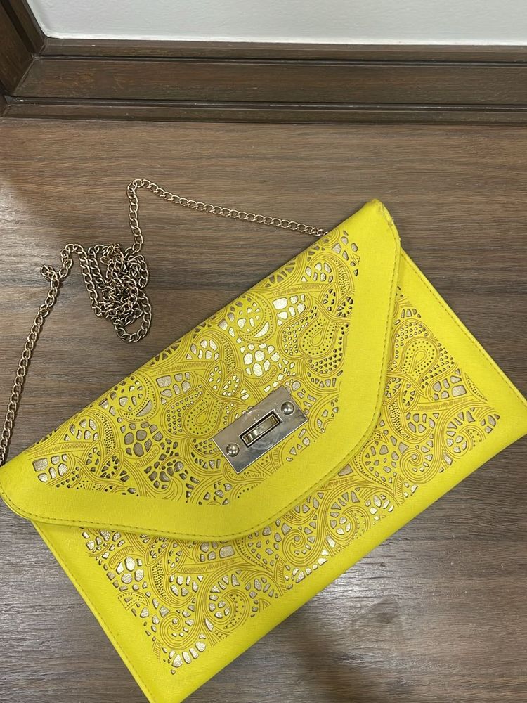 A Neon Cutwork Envelope Sling Bag