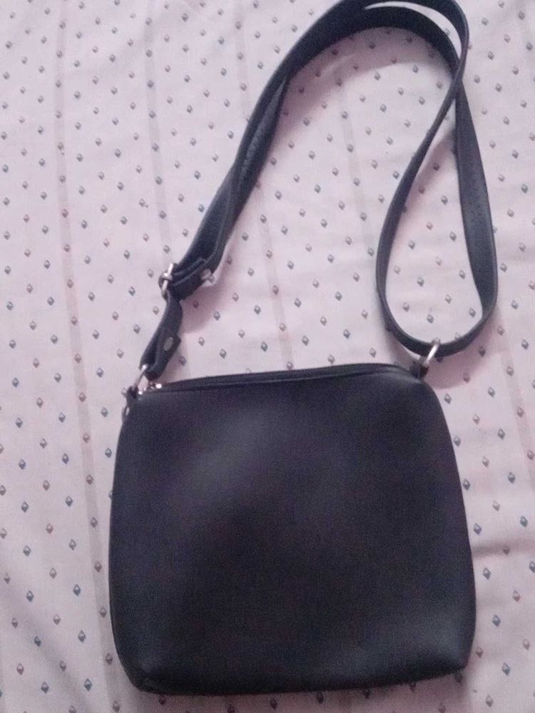black sling bag