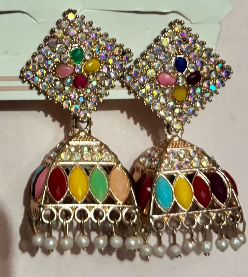 Traditional Earings Along With Dazzling Ring