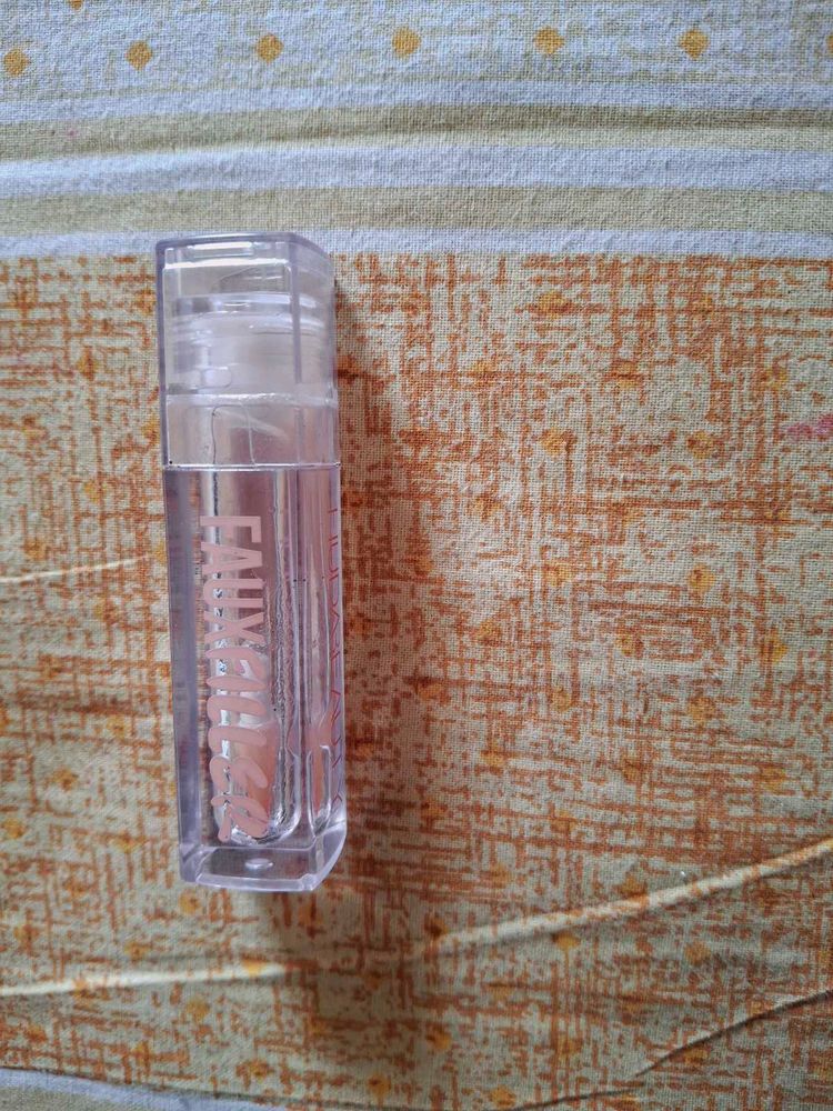 HUDAFAUX FILLER LIPGLOSS TRANSPARENT