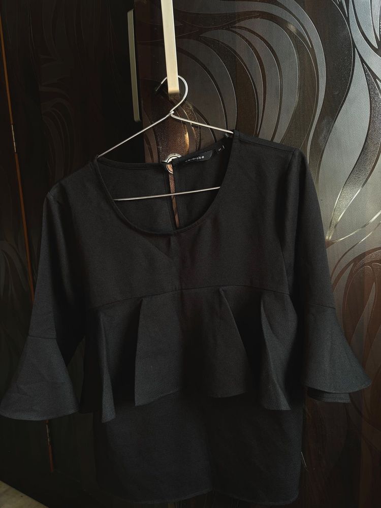 Elegant Black Peplum Top