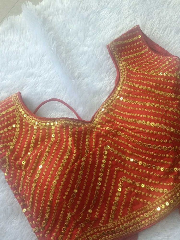 Red Sleeveless Blouse
