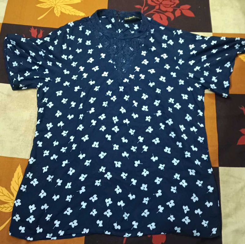 A Navy Blue Floral Top