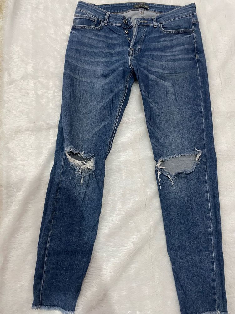 ZARA Ripped Knee Jeans