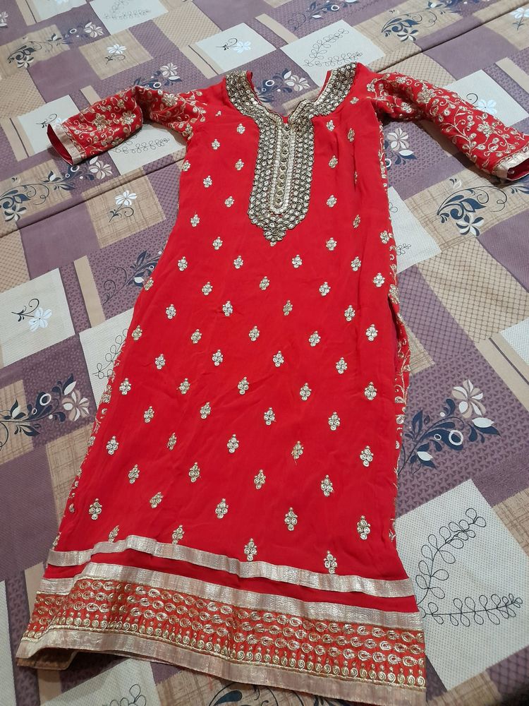 Red tamato color party wear kurta.