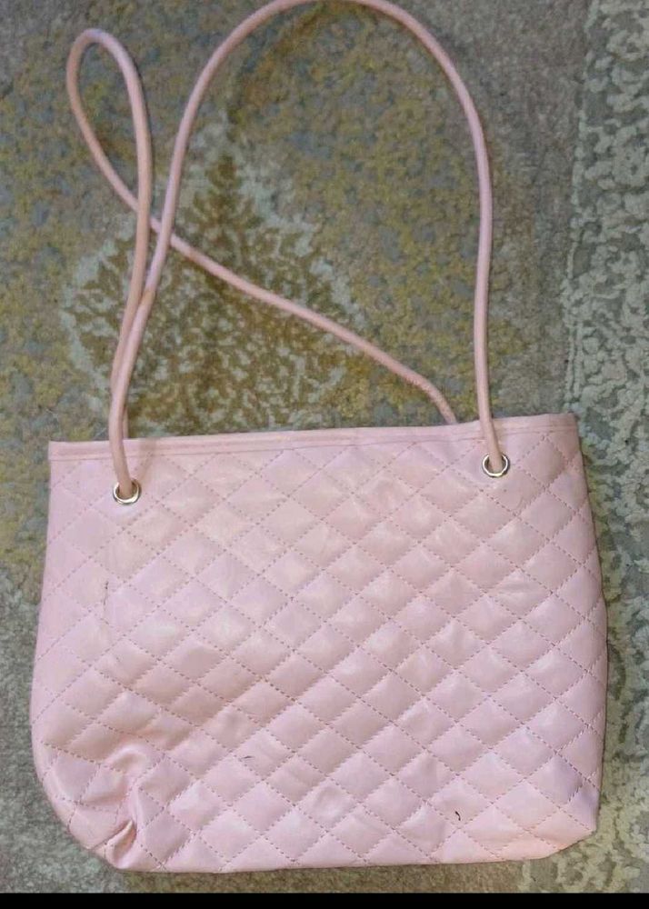 pink hand bag