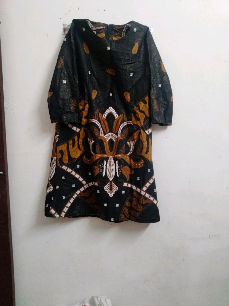 Beautiful Black Printed Kurthi With Golden Self Lines