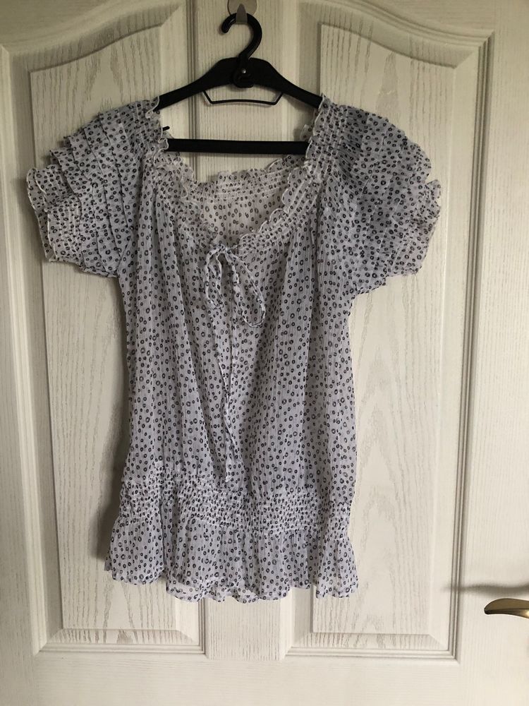 Sheer very cute top.