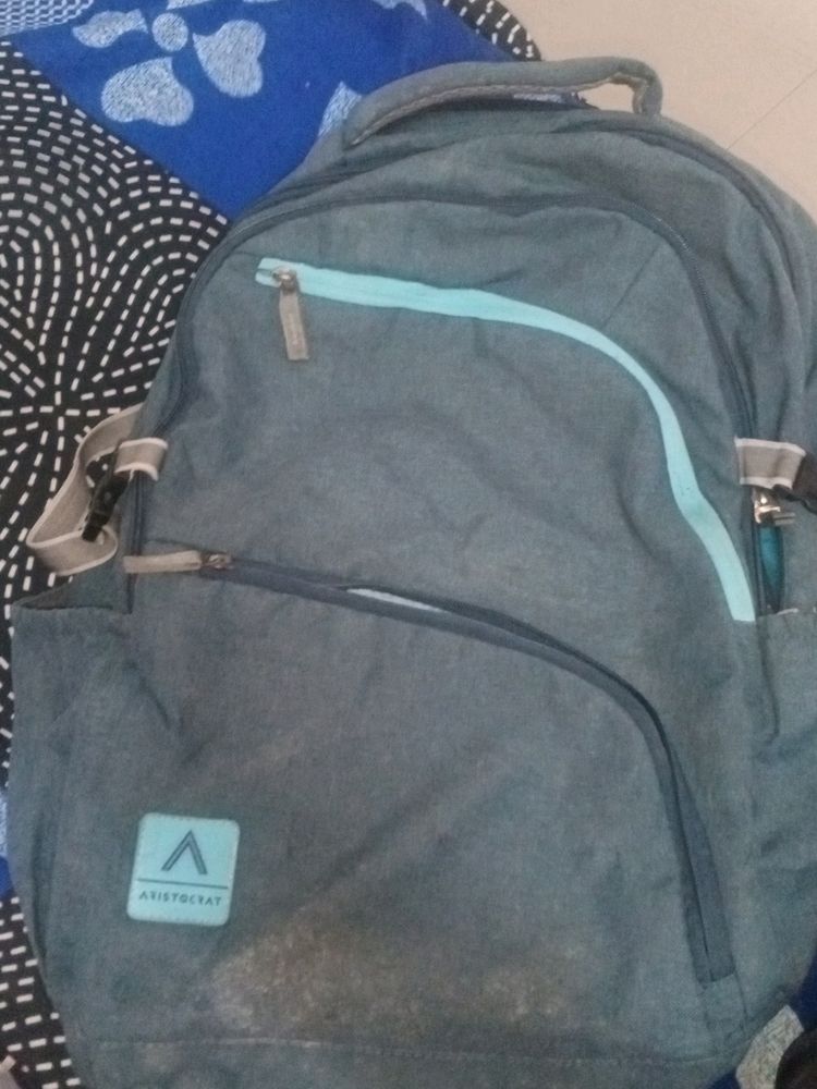 BAG IS IN GOOD QUALITY , ALL GIPS ARE WORKING AND it is branded bag brand - Aristocrat