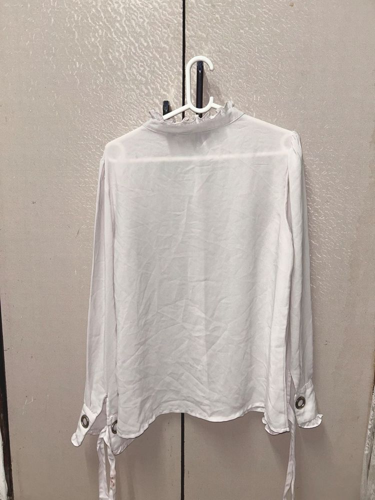 Elegant White Ruffled Blouse