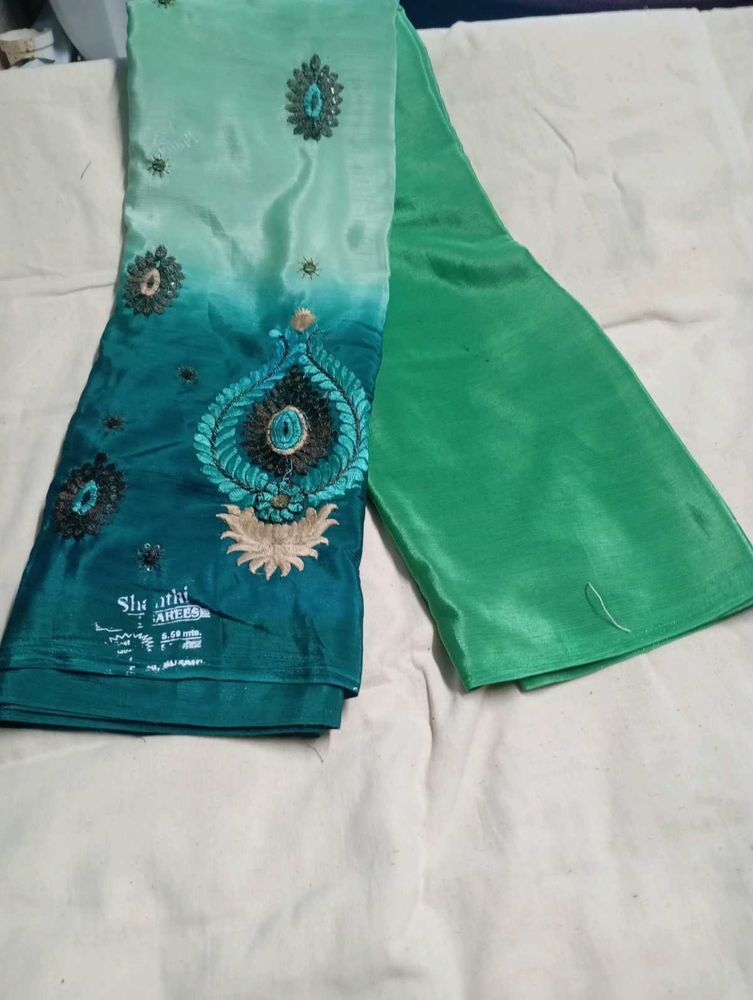Elegant Green Embroidered creap Saree