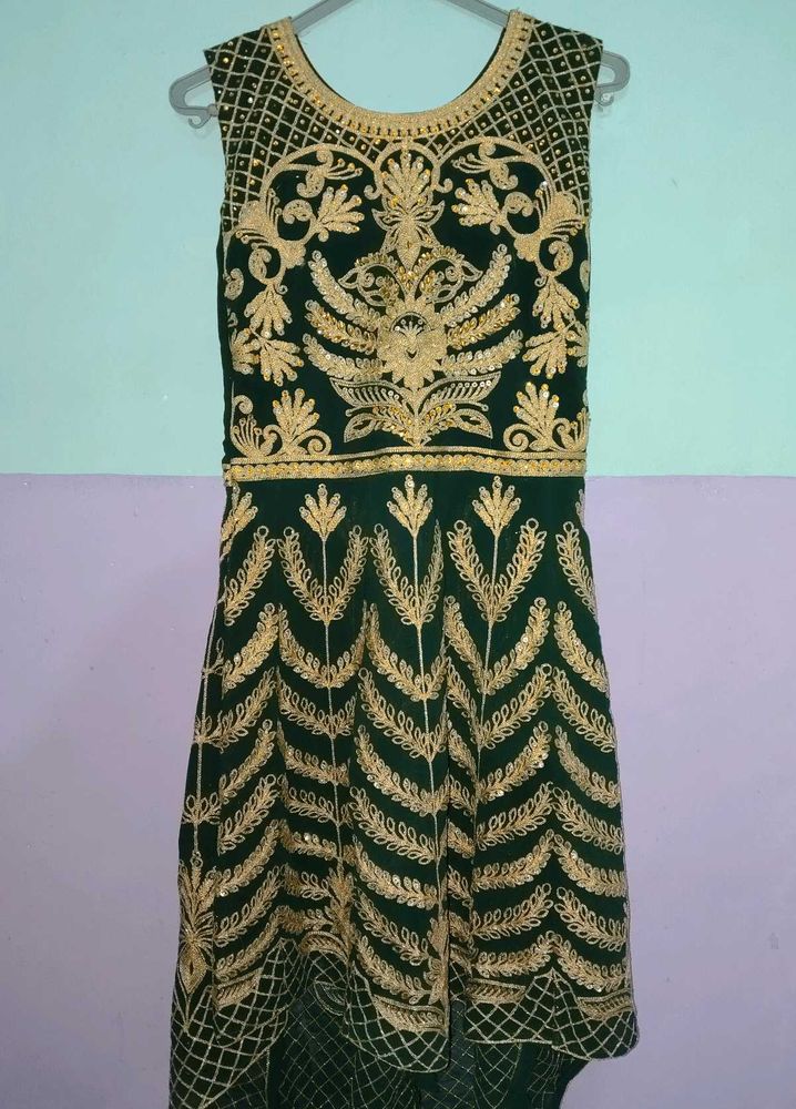 A Dark Green Coloured Lehenga,100% qualified,