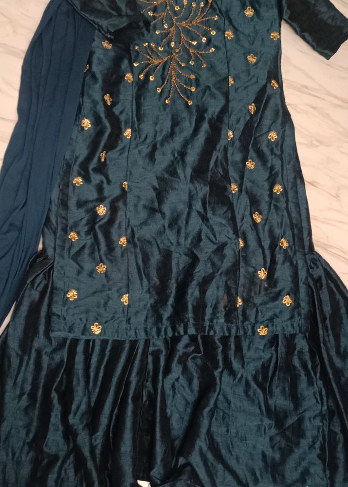 Its a Blue Dress.. With Beads Work On It.