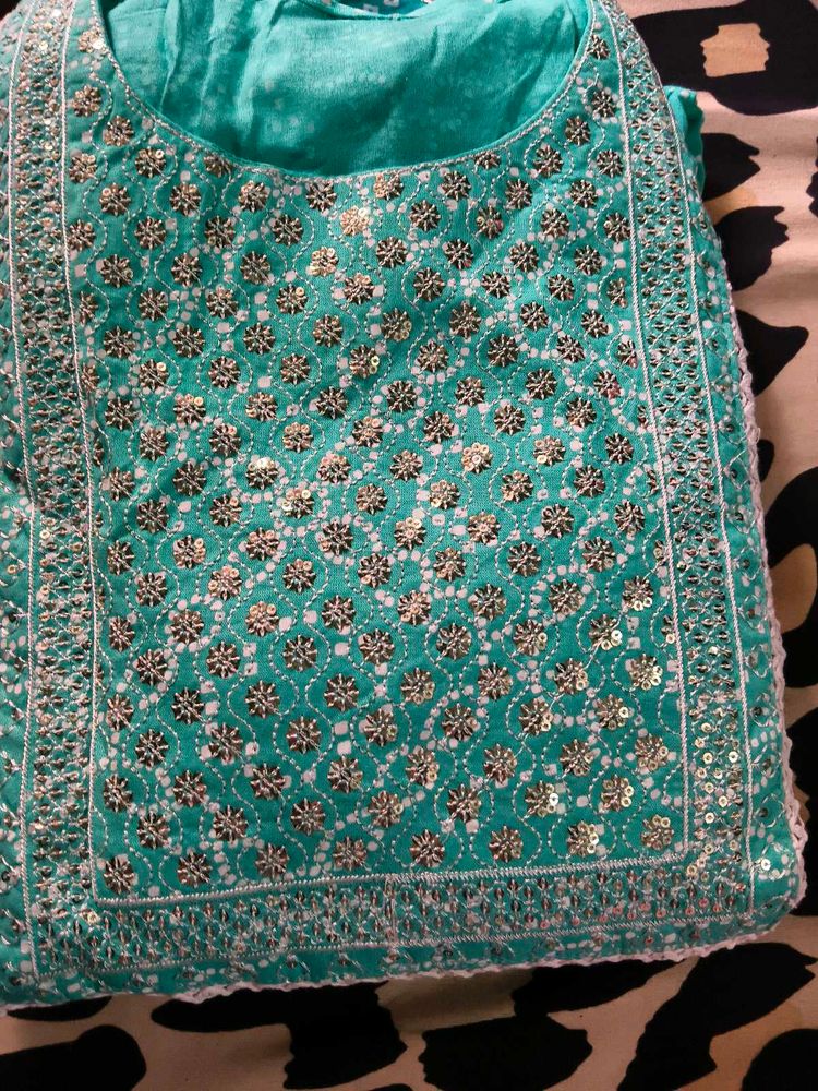 New,New,New. Teal Embroidered Kurti,