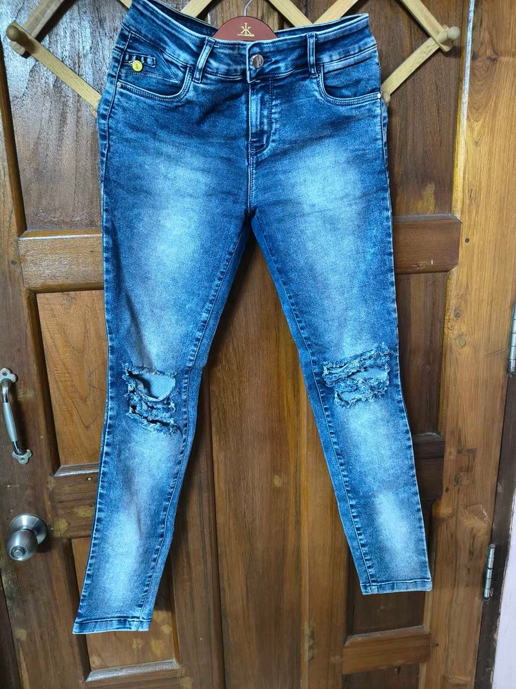 Ripped Blue Denim Jeans