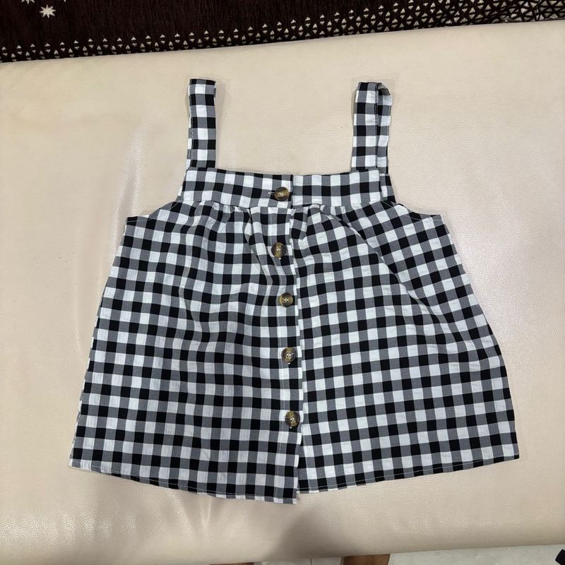 A Black and White Crop Top