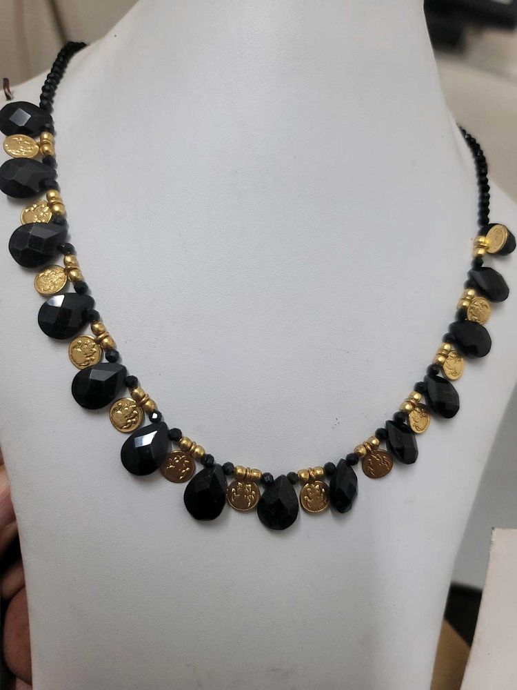 Black Beads With Gold Bead