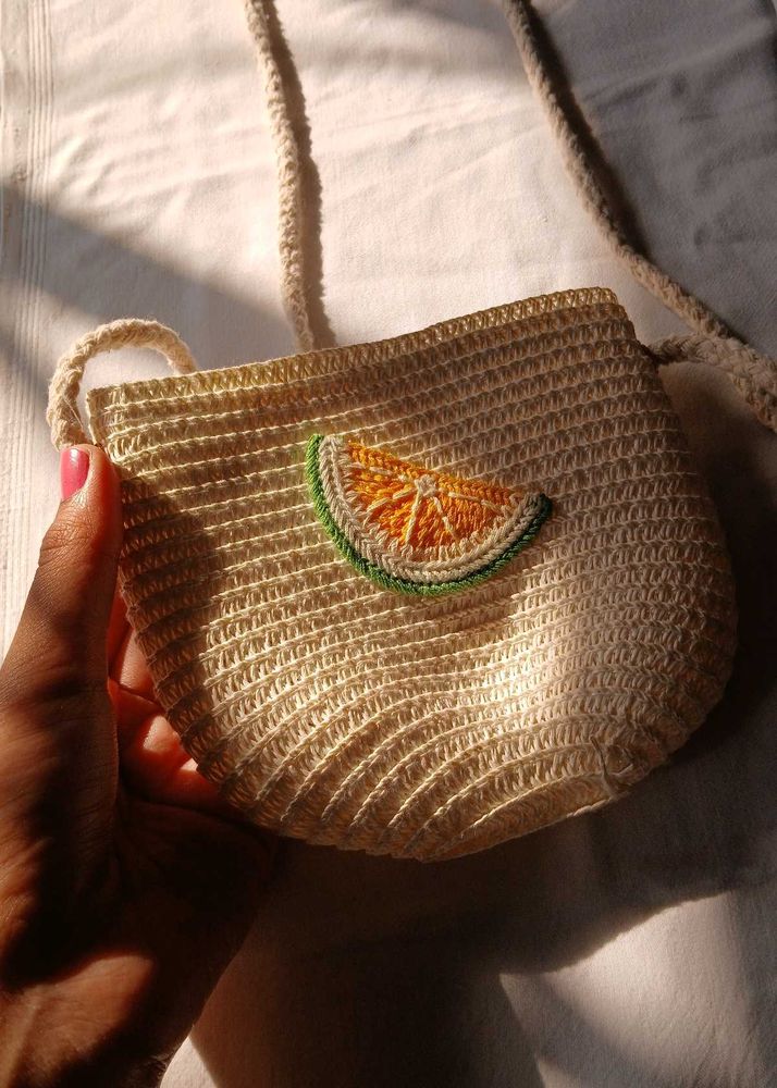 A sling purse
