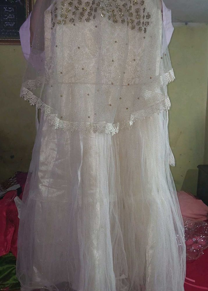 Cream Gown With Top Layer Work Of Stones