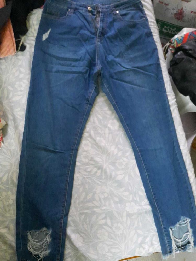 Distressed Denim Jeans