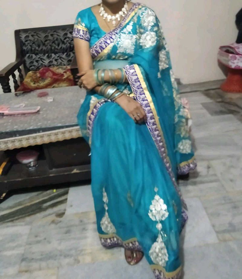 Elegant Teal Embroidered Saree