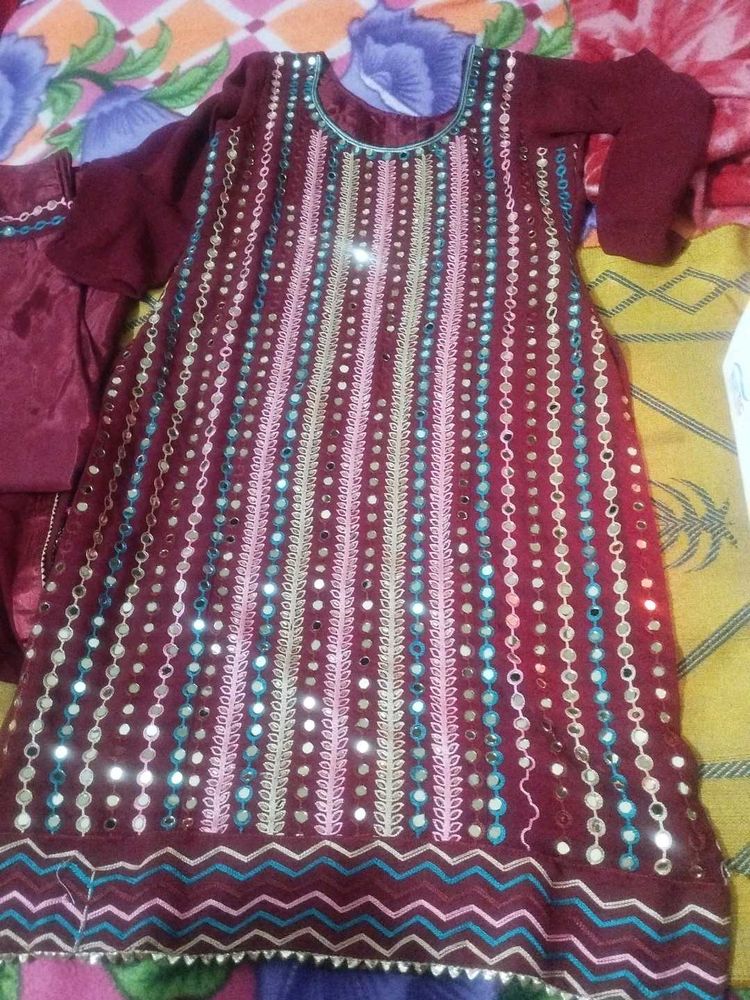 beautiful festive mirror work suit