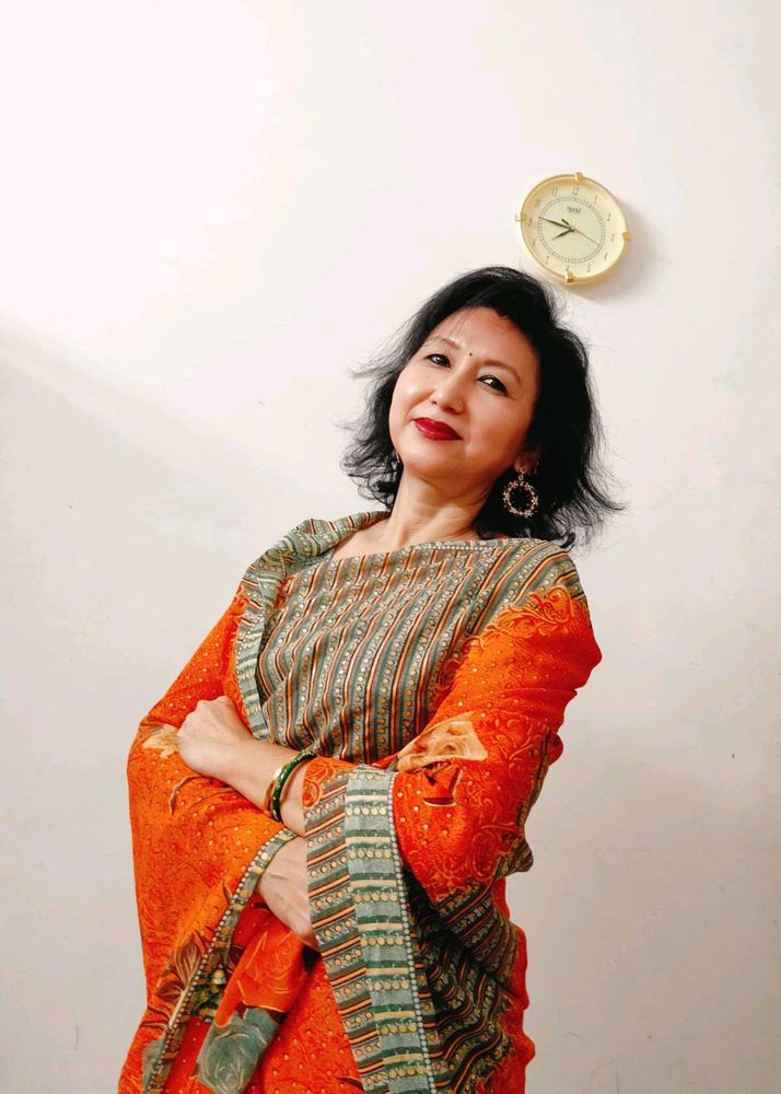 Elegant Orange Printed Saree with Floral and Geome