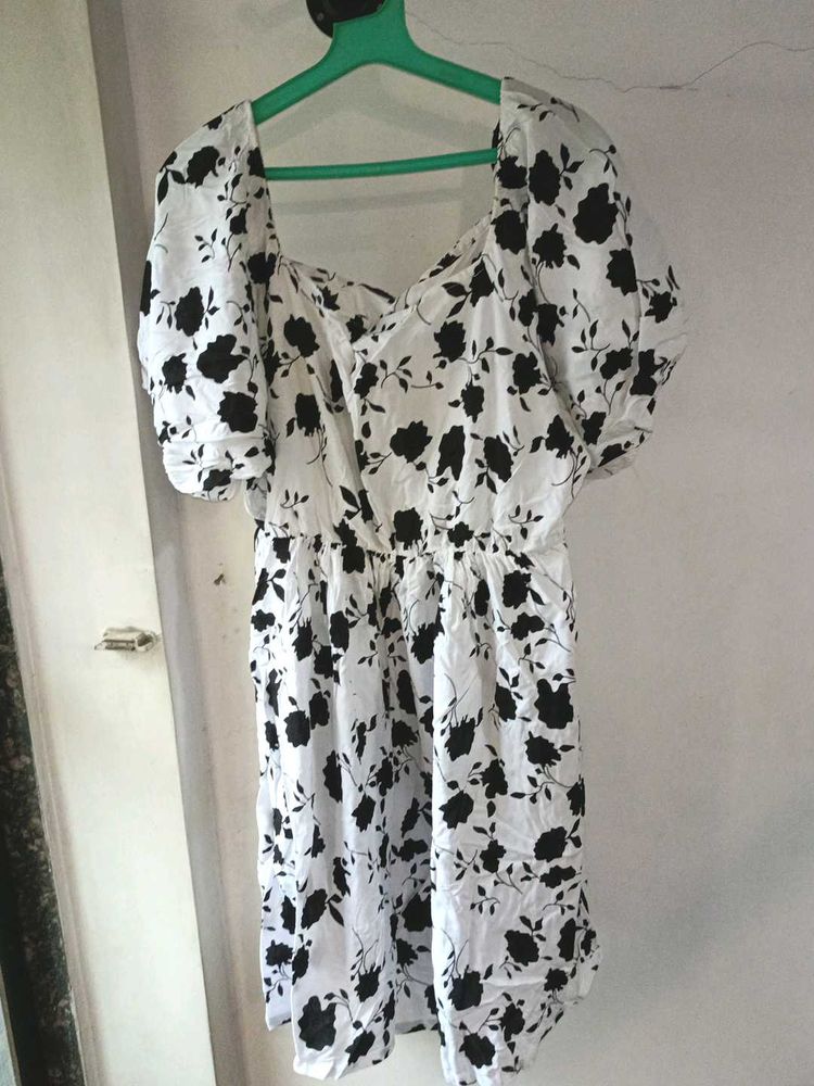 It&#39;s a White Mini One Piece