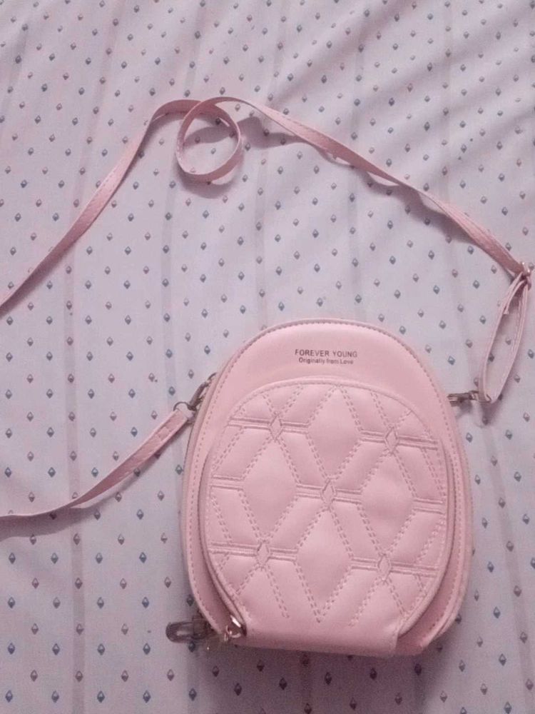 COMBO Of sling bag pink colour And Guess Watch